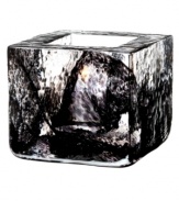 Combining the distinct features of brick and the transparency of glass, this Kosta Boda votive holder adds a fresh pop of white and shine to modern spaces. Designed by Anna Ehrner.
