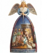 Jesus and the holy family get acquainted in this classic nativity scene, hand-painted in an angel's gorgeous gown. A meaningful gift or beautiful piece for prominent display, with the incredible detail of Jim Shore.