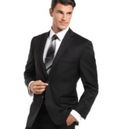 In basic black, this Calvin Klein blazer is the perfect foundation for a look that is strong on details.