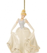 Fans of Disney will be enchanted by this beautiful Cinderella ornament from Lenox. The princess wears a traditional ballgown with sparkle accents. With gold hanging thread.