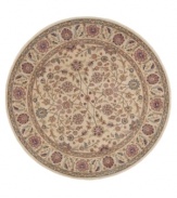 Inspired by the lyrical beauty of ancient Persian carpets, this round rug features a field of flowers entwined in a curvilinear design with a warm palette of pumpkin, mauve and moss green against a soft beige ground. Woven of premium Opulon(tm) yarns to create a lavish pile with a rich, color-enhancing finish.