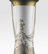 Meaning sparkle in Italian, this opulent vase is aptly named as it shimmers with over 2800 hand-set crystals, 24k gold accents and 14k goldplated chains.Fine bone chinaSwarovski Elements crystals17H X 10W X 7.5DHand washImported