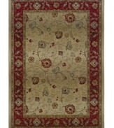 Pristine patterns swirl gracefully against a neutral ground, surrounded by a vivid red border that holds various vines and blossoms.
