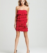 Tiers of flouncy ruffles cascade down this BCBGMAXAZRIA strapless dress for a look of youthful femininity.