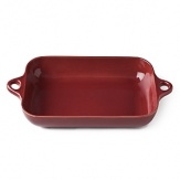 Inspired by discoveries in South America, DVF designs bakeware. Sized to chef's standards, deeply colored in DVF style and given a brilliant glaze, this oven-to-table collection is as decorative as it is functional. Safe to use in the oven and on the table. Stoneware with reactive glaze, knob in Riverstone shape.