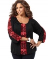 Snag a boho spirit with INC's three-quarter sleeve plus size top, highlighted by beaded embroidery.
