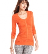 Planet Gold takes a basic top and enhances it with sleek ruching, button-down style and a fit that shows off your curves!