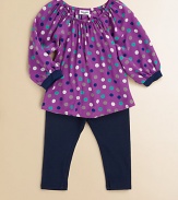 A mod-inspired, colorful polka dot print adorns a gathered tunic and paired with matching leggings for a charming set. Tunic Gathered elasticized round necklineLong puff sleevesPullover style Leggings Elastic waistband47% pima cotton/47% modal/6% spandexLeggings: RayonMachine washImported