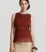 A study in contrasts, this Alice + Olivia lace tank is designed with a demure scallop hem and edgy exposed back black zipper. Truly versatile, wear it with elegant skirts or rock it downtown-style with leather pants.