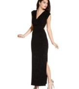 Dark glamour: a stunning open-back brings a touch of screen-siren allure to this twinkling gown from Jump that marries seductive, au-courant style with old-school elegance.