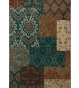 A fresh, modern floral-and-damask motif pops in teal and other cool tones, captured in a perfect patchwork on this plush area rug from Karastan. Woven from lush nylon that delivers softness underfoot and superb resistance to everyday wear.