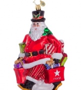 Even Santa gets caught up in the magic of Macy's, picking up a few things for Mrs. Claus in this brilliantly handcrafted ornament by Christopher Radko.