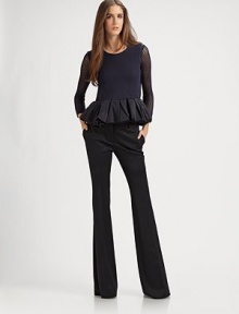 Finespun Italian wool, in a flattering wide-leg silhouette.Self waistband with belt loopsZip fly with hook-and-bar closureSide slash pocketsBack button welt pocketsSilk liningInseam, about 3593% polyamide/7% elastaneDry cleanMade in ItalyModel shown is 5'9½ (176cm) wearing US size 4. 