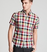 Colorful checks alert everyone to your laid-back attitude and keen sense of trend with this handsome short-sleeve button-down that's perfect for warm weather days.