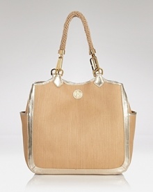 The St. Barths bound will love the latest, beachy addition to Tory Burch's polished portfolio. In woven straw with metallic leather trim this tote perfects on-vacation style. The St. Barths bound will love the latest, beachy addition to Tory Burch's polished portfolio. In woven straw with metallic leather trim this tote perfects on-vacation style.