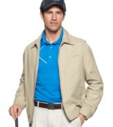 Confront a cooler weekend forecast with the clean, classic style of this  SHARK Greg Norman for Tasso Elba fitted zip-up jacket.