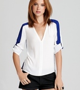 Introduce the color-block trend into your wardrobe with this BCBGMAXAZRIA top, accented with a pop of contrast color.