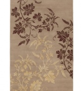 An intricate and striking floral motif cascades across a soothing ground in this Karastan area rug, offering a soothing nature-inspired accent for any room. Thick and resilient underfoot, this plush piece is woven from 2-ply nylon pile, ensuring easy care and long-lasting wear.