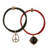 Decoratively detailed. Add pretty panache to your hairstyle with Lucky Brand's elastic hair bands. Featuring peace sign and crystal charms, they're made in plastic and set in gold tone mixed metal. Approximate diameter: 1-3/4 inches. Approximate drop: 1 inch.