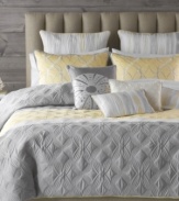 Two to tango. Allover embroidery renders supreme texture in this Tango comforter set from Bryan Keith, featuring a delicate color palette of muted gray, yellow and white for a soothing appeal. Shams and decorative pillows offer complementary embroidered designs for a complete look that pays close attention to detail. Pair with matching window panels.