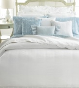 A vintage scroll pattern in a muted blue and white palette adorns this flat sheet from Lauren by Ralph Lauren for a traditional and elegant allure.