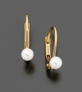 These dainty 14k gold leverback earrings are adorned with a single luminous cultured pearl.