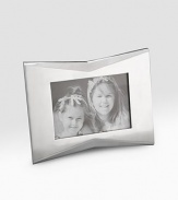 A classic frame in lustrous alloy metal is tweaked with a pinched detail and fits a vertical or horizontal photo. Accommodates a 5 X 7 photograph Wipe clean Imported 