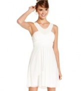 A delicately beaded neckline adds high, regal style to this lovely party dress from Trixxi.
