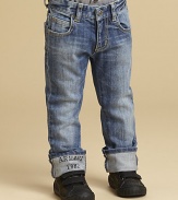 Slightly faded, subtly distressed and whiskered, with logo cuffs in a slim-fitting silhouette.Front button closureWaistband with belt loopsZip flyFive-pocket styleCottonDry cleanImported