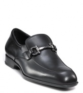Luxe dress loafers made with supple leather, imported from Italy. Rounded toe, slip on style with gancini buckle across the foot. Leather sole with slight stack heel.