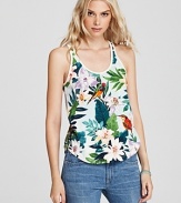 Pretty as a postcard, this Juicy Couture tank flaunts a vibrant tropical print for an enchanting summer escape.