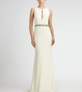 Sleek and impeccably tailored, this sweeping design is accented with an alluring front keyhole and a beaded waistband.Jewel necklineSleevelessFront keyholeBeaded waistbandBack trainConcealed back zipFully linedAbout 46 from natural waistPolyester/spandexSpot cleanImportedModel shown is 5'10 (177cm) wearing US size 4. 