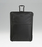 An extra-large, extra versatile expandable wheeled packing case with a bonus Just in Case tote to carry home travel acquisitions. Main compartment with pop-up expansion Removable garment sleeve Two exterior zip accessories pockets Two inside accessories pockets plus tie pocket Top, side and bottom carry handles Telescoping handle Protective feet Tumi Tracer Protection Ballistic nylon Imported 21W X 28H X 11D (13½D expanded)