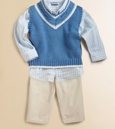 Preppy to perfection, this classic knit is embellished with contrasting stripes for a stylish look. V-neckSleevelessPullover styleCottonMachine washImported