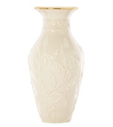 Canterbury bells spring from ivory porcelain, giving this Lenox Floral Meadow vase a delightfully understated grace. A band of sumptuous gold adds to its classic allure. Qualifies for Rebate