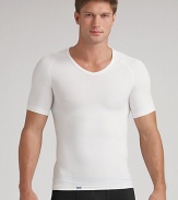 An essential underlayer or workout separate with an exclusive design that builds in physiotherapy taping techniques to gently pull the shoulders back and promote optimal alignment. Seamless stitching and targeted mesh provides a breathable, second skin fit. Polyester/nylon/spandex; machine wash Imported