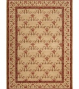 Outfit your home in old-world elegance. A wonderfully ornamental European-inspired motif with vines and blossoms gives this hand-carved wool rug a look of fine-tuned beauty. Soft and inviting in warm beige, the rug is an inspired choice for living areas and dining rooms.