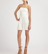 Woven cotton lace, in a strapless silhouette cinched with a self belt.StraplessSelf beltGathered skirtConcealed back zipAbout 19 from natural waist75% cotton/25% nylonDry cleanImported of domestic fabricModel shown is 5'11 (180cm) wearing US size 4. 