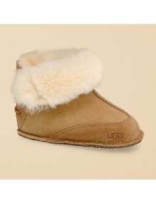 Made from plush twin-faced sheepskin, a reinforced heel and toe keep tiny feet protected while elastic cord detail adds a little fun. Logo embossed suede bottom Booties size: S (0-8 months), M (9-16 months), L (17-24 months). Imported Made from plush twin-faced sheepskin, a reinforced heel and toe keep tiny feet protected while elastic cord detail adds a little fun. Logo embossed suede bottom Booties size: S (0-8 months), M (9-16 months), L (17-24 months). Imported