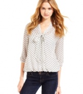 Punch up your day look with this three-quarter sleeve top from Fresh Brewed! Polka-dot-print and bow-blouse style unite with playful sophistication.