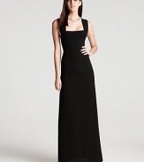 Long and lean, this graceful BCBGMAXAZRIA dress is timeless in black, finished with a cutout V back for a sophisticated finish.