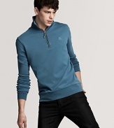Burberry's sleek sweater rendered in a weathered garment wash for a comfy, lived-in look.