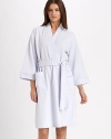 EXCLUSIVELY AT SAKS. Wrap yourself in this textured design for essential comfort.Front pockets Self belt 60% cotton/40% polyester Machine wash Imported