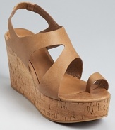 Natural cork forms a sturdy wedge on these Eileen Fisher sandals, a classic style with serious staying power.