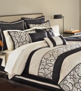 Martha Stewart Collection's Manuscript comforter set writes a stylish story with elegant loops and swirls inspired by ornate calligraphy. Matching accent pillows add a decorator's touch, while the serene palette of black and cream coordinates beautifully with modern and traditional rooms alike.