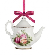 If you love it on your table, you'll adore it on the tree. This Old Country Roses ornament bears the classic pink and gold florals of Royal Albert's famed dinnerware collection in a mini teapot design.