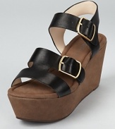 A chunky platform wedge in soft suede gives way to smooth leather straps on these statement-making Rosegold sandals.