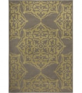A classic medallion design is brought to life in lush hues of green and grey in this Zanzibar area rug from Sphinx. Its streamlined, low-cut pile and durable construction offer a handsome, lasting finish to any room. (Clearance)