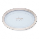After forming the textured glass of this fine challah platter, craftsmen hand-paint an opulent band of platinum for a breathtaking finish, and spell out challah in Hebrew characters on the center.
