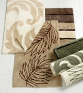 With a deep pile, earthy colors and garden-inspired designs, these decorative rugs from Charter Club are a beautiful addition to the natural bath. The Damask reversible rug features an abstracted leaf swirl both front and back. An illustration-like fern design makes a bold impression on the Beachfront rug. The Shimmer rug features multicolored wide stripes in neutral earth hues separated by dark brown bands of silky, shimmering threads.